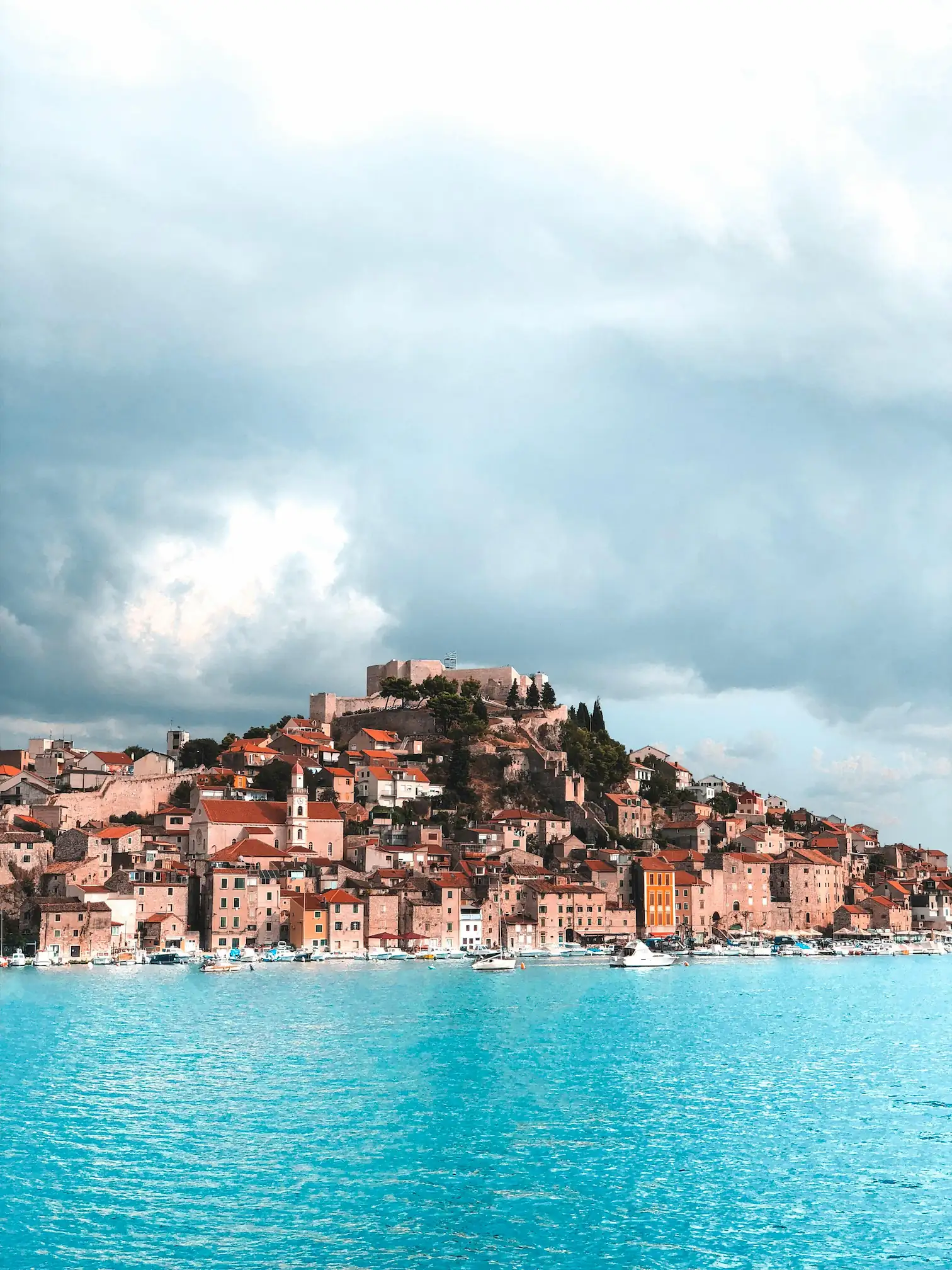 Blue Sea with City as background